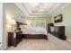 Primary bedroom showcasing trey ceiling, carpet flooring and bright, airy feel at 4170 Haynes Mill Nw Ct, Kennesaw, GA 30144