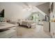 Cozy bedroom with ceiling fan, dormer window, desk and comfortable decor at 4170 Haynes Mill Nw Ct, Kennesaw, GA 30144