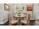 Cozy dining nook with a round table, bathed in natural light at 4170 Haynes Mill Nw Ct, Kennesaw, GA 30144