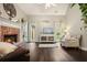Inviting living room with a fireplace, hardwood floors, and comfortable seating at 4170 Haynes Mill Nw Ct, Kennesaw, GA 30144