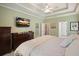 View of a light green primary bedroom with furniture and a view to the ensuite at 4170 Haynes Mill Nw Ct, Kennesaw, GA 30144