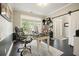 Office space featuring a large window, desk, and stylish decor at 4170 Haynes Mill Nw Ct, Kennesaw, GA 30144