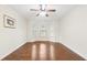 Comfortable bedroom offering hardwood floors, a ceiling fan, crown molding, and great natural light at 2760 Lions Gate Dr, Cumming, GA 30041