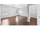 Bedroom with wood flooring, windows, and a closet for storage at 2760 Lions Gate Dr, Cumming, GA 30041