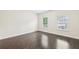 Bedroom featuring hardwood floors and natural light at 2760 Lions Gate Dr, Cumming, GA 30041