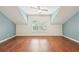Bonus room with wood flooring, vaulted ceilings, and plenty of natural light at 2760 Lions Gate Dr, Cumming, GA 30041