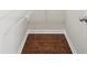 Walk-in closet with hardwood floors and wire shelving at 2760 Lions Gate Dr, Cumming, GA 30041