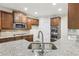 Gourmet kitchen with stainless appliances and granite counters at 2760 Lions Gate Dr, Cumming, GA 30041