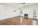 Bright living room with hardwood floors and a cozy fireplace at 2760 Lions Gate Dr, Cumming, GA 30041