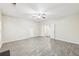 Living room featuring light wood floors, a ceiling fan, and natural light at 2760 Lions Gate Dr, Cumming, GA 30041