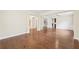 Spacious living room with hardwood floors and neutral paint at 2760 Lions Gate Dr, Cumming, GA 30041