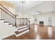 Spacious living room featuring hardwood floors and stair access at 2760 Lions Gate Dr, Cumming, GA 30041