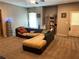 Cozy living room with plush seating, a large window, and neutral carpet at 305 Anise Ct, Mcdonough, GA 30252