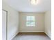 Neutral bedroom with tan walls and window at 3197 Ward Sw Dr, Atlanta, GA 30354