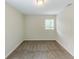 Neutral bedroom with tan walls and window at 3197 Ward Sw Dr, Atlanta, GA 30354