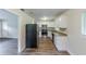 Kitchen showcasing stainless steel appliances, white cabinetry and granite countertops at 3197 Ward Sw Dr, Atlanta, GA 30354