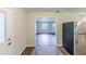 Charming kitchen view featuring hardwood floors and stainless steel refrigerator at 3197 Ward Sw Dr, Atlanta, GA 30354