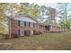 Brick home on a landscaped lot, showcasing classic architectural details and curb appeal at 3497 Highway 5, Douglasville, GA 30135