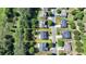 An aerial view shows the property outlined with a yellow border, surrounded by lush trees and neighborhood homes at 645 Earlham Dr, Suwanee, GA 30024