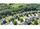 Aerial view of a home's location with a yellow property line, landscaped yard and neighborhood in a mature area at 645 Earlham Dr, Suwanee, GA 30024