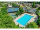 Aerial view of community amenities including a pool, tennis, basketball court, and clubhouse at 645 Earlham Dr, Suwanee, GA 30024