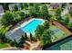Aerial view of the community pool area with a pool and basketball court at 645 Earlham Dr, Suwanee, GA 30024