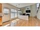 Sunlit dining area adjacent to the kitchen, features hardwood floors and access to the backyard at 645 Earlham Dr, Suwanee, GA 30024
