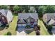 Charming two-story brick home with a well-manicured lawn and a two-car garage at 645 Earlham Dr, Suwanee, GA 30024