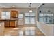Bright kitchen and dining area with hardwood floors and sun-filled windows at 645 Earlham Dr, Suwanee, GA 30024