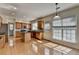 Spacious kitchen featuring wooden cabinets, stainless appliances, and a functional kitchen island at 645 Earlham Dr, Suwanee, GA 30024