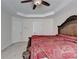 Spacious main bedroom featuring tray ceiling, ceiling fan, and neutral carpeting at 645 Earlham Dr, Suwanee, GA 30024