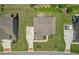 Home's manicured lawn, long driveway, and beautiful landscaping offer great curb appeal at 2520 Wood Fern Ln, Cumming, GA 30041