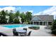 A pristine community pool, perfect for relaxation and recreation in a Gathering-friendly neighborhood at 2520 Wood Fern Ln, Cumming, GA 30041