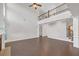 Spacious living area with hardwood floors, tall ceilings, a fireplace, and elegant white trim at 2520 Wood Fern Ln, Cumming, GA 30041