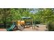 A colorful and inviting playground in a community for children to play at 2520 Wood Fern Ln, Cumming, GA 30041