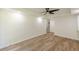 Large finished basement showcasing modern flooring, recessed lighting, and access to the upper level stairs at 3275 Clifton Church Se Rd, Atlanta, GA 30316