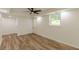 Finished basement with new flooring, recessed lighting, and a window, offering a modern living space at 3275 Clifton Church Se Rd, Atlanta, GA 30316