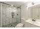 Well-lit bathroom featuring a glass-enclosed shower, modern vanity, and neutral color scheme at 3275 Clifton Church Se Rd, Atlanta, GA 30316