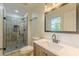 Bathroom features a glassed walk-in shower, modern vanity, and sleek fixtures at 3275 Clifton Church Se Rd, Atlanta, GA 30316