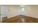 Bedroom features wood floors, an overhead fan, and freshly painted walls at 3275 Clifton Church Se Rd, Atlanta, GA 30316