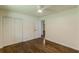 Bright bedroom features gleaming wood floors and a ceiling fan for added comfort at 3275 Clifton Church Se Rd, Atlanta, GA 30316