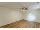 Cozy bedroom boasts a ceiling fan, natural light and wood-look flooring at 3275 Clifton Church Se Rd, Atlanta, GA 30316