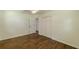 Bedroom features include wood-look flooring, neutral walls, closet, ceiling fan, and an entry door at 3275 Clifton Church Se Rd, Atlanta, GA 30316