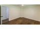 Cozy bedroom featuring hardwood floors, neutral walls, and a ceiling fan for comfort at 3275 Clifton Church Se Rd, Atlanta, GA 30316