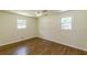 Cozy bedroom with hardwood floors, natural light, and a ceiling fan at 3275 Clifton Church Se Rd, Atlanta, GA 30316