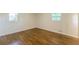 Bedroom showcasing hardwood floors, natural light, and fresh neutral paint at 3275 Clifton Church Se Rd, Atlanta, GA 30316