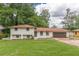 Charming two-story home with a brick exterior, well-manicured lawn, and a two-car garage at 3275 Clifton Church Se Rd, Atlanta, GA 30316