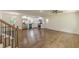 Open concept living room and kitchen with stainless steel appliances and wood floors at 3275 Clifton Church Se Rd, Atlanta, GA 30316