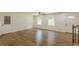 A bright living room featuring hardwood floors, fresh paint and a modern ceiling fan at 3275 Clifton Church Se Rd, Atlanta, GA 30316