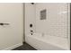 Modern shower with white subway tile and black accents at 3275 Clifton Church Se Rd, Atlanta, GA 30316